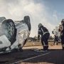 Rescue,Team,Of,Firefighters,Arrive,On,The,Car,Crash,Traffic